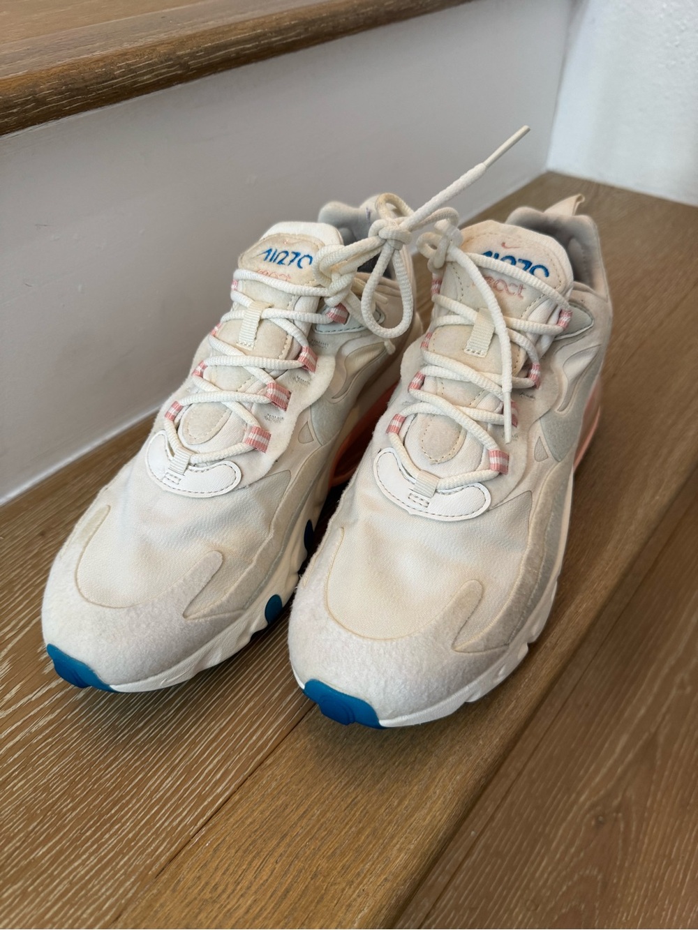 Nike Off-White/Beige Sneakers with Blue and Pink Accents